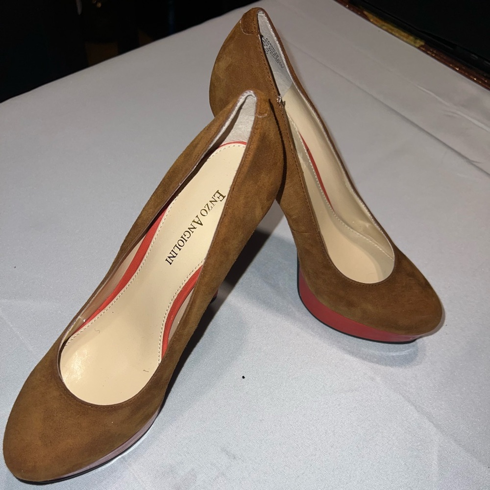 Two toned brown/ burnt orange in color